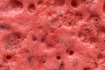 red drink foam background