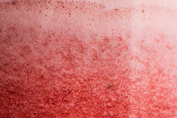 red grunge background. red drink.