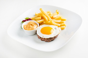 cutlet with egg and french fries