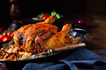 Grilled spicy chicken with barley groats and mushrooms
