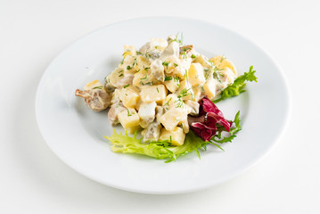 Traditional salad with cooked vegetables with mayonnaise.