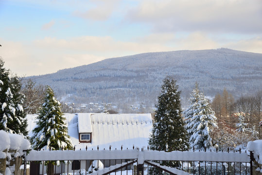 View on  Swieradow Zdroj resort in winter, northern slope of the Jizera Mountains, Poland