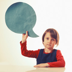 I am thinking about something. Portrait of conceived little child girl with thinking bubble...