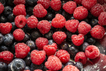 fresh raspberries and blueberries