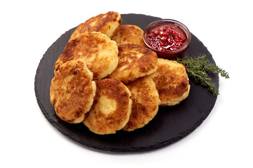 Homemade Cottage cheese pancakes with jam, close-up, isolated on white background