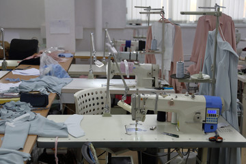 A small workshop for sewing clothes with professional equipment and tools