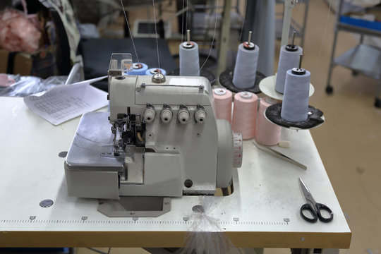 A small workshop for sewing clothes with professional equipment and tools