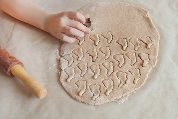 Concept preparing Easter food with child in the kitchen, home leisure