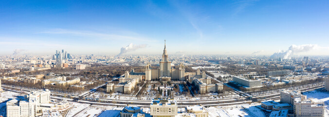 Aerial view of Lomonosov Moscow State University (MGU, MSU) on Sparrow Hills, Moscow, Russia. Panorama of Moscow with the Main building of University. Beautiful Moscow view from above in winter.