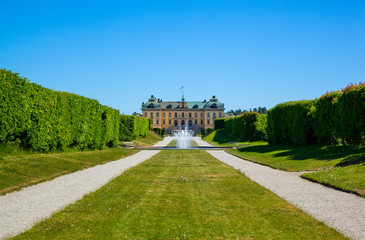 View of Drottingholm Palace with its fountains, trees and walking paths