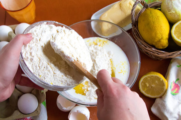 ingredients for homemade lemon cake, which are on the table