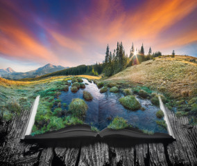 Alpine mountain valley on the pages of book