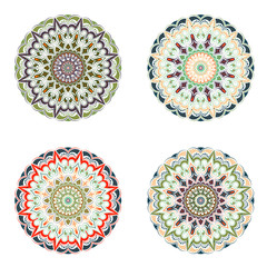  Set of four mandala - on a white background, floral motifs, crystal form. Symbol of harmony. Warm colors - orange, green, brown.