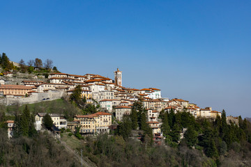Fototapeta na wymiar Sacro Monte of Varese (Santa Maria del Monte). Picturesque view of the small medieval village. World heritage site - UNESCO site in Varese, Italy