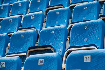 Naklejka premium Empty blue seats in stadium