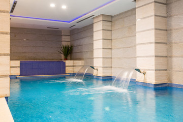 Swimming pool in hotel spa and wellness center