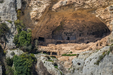 Caves were used as hide-outs by Byzantines and Arabs. Cava Grande del Cassibile Natural Reserve, Siracusa, Sicily, Italy. 
