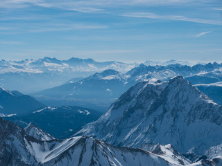 View from the German Zugspitze across the top of a snow mountain landscape