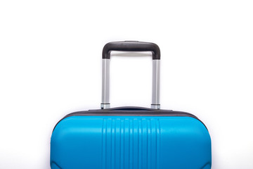 Blue suitcase on white background Creative Summer holidays, vacation, travel concept