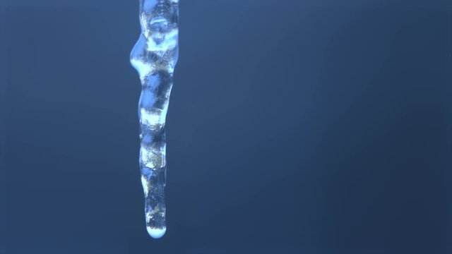 Maco tilt down to reveal the end of a melting icicle dripping