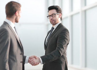 friendly handshake of business partners