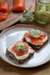 Scandinavian dark bread with cured trout , micro herbs, cucumber chutney and horseradish cream 