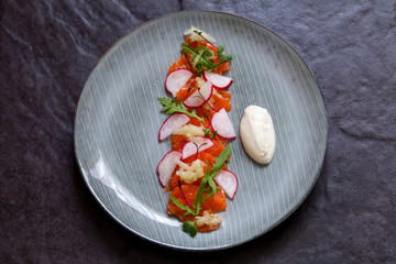 Cured trout with radishes, micro herbs, cucumber chutney and horseradish cream 