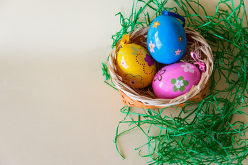 Easter eggs in wicker basket.