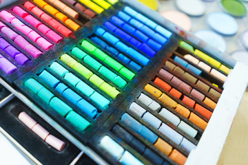 Pastel crayons paint special palette box.  Accessories and tools of the artist for drawing.