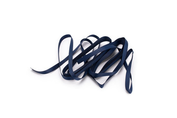 Naklejka premium Blue satin ribbon on white background