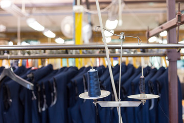 Detail close up shot of garment production line. 