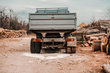 Obraz premium Picture of big truck in sawmill waiting to be loaded.