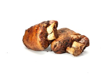 Roasted pork knuckle, on a white background.