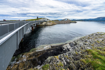 Fototapeta na wymiar Pedestrian walkway along the Atlantic Road (Atlanterhavsvegen) one of the most popular tourist sites in Norway