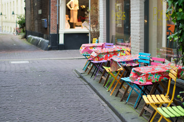 HAGUE, NETHERLANDS - APRIL 15, 2018: Outdoor cafe. Chairs and tables on the sidewalk