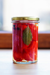 Jar of fermented peppers