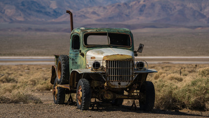 Old truck in riuns in the desert