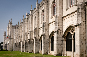 Fototapeta na wymiar White stone facade of a medieval cloister in Portugal