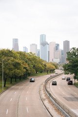 Fototapeta na wymiar Memorial Parkway and the skyline in Houston, Texas
