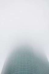 Modern skyscraper in fog, in Houston, Texas