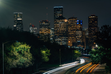 Fototapeta na wymiar Memorial Drive and the Houston skyline at night, in Houston, Texas
