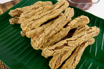 Malaysian fried fish snacks called Keropok Lekor.
