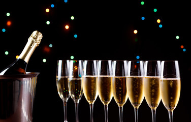 Champagne glasses on black background. Holiday celebration concept.