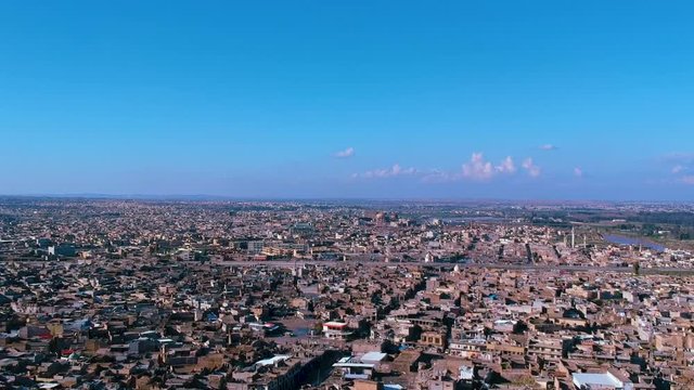 Fly over drone shot of Mosul city after the military operation against ISIL.