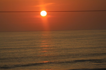 Un atardecer frente al mar