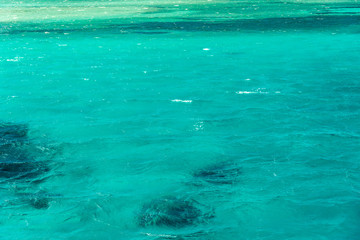Fototapeta na wymiar texture blue sea or ocean water full frame