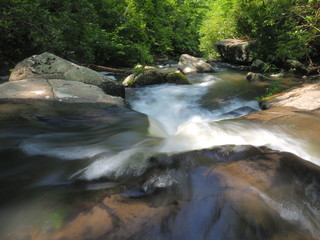 Naklejka na ściany i meble Yellow Creek Falls near Robbinsville, North Carolina, flowing strongly after heavy summer rains.