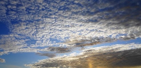 Beautiful blue sky with clouds close up.