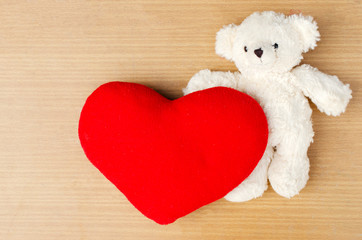 White teddy bear with red heart for valentine day  backgrounds