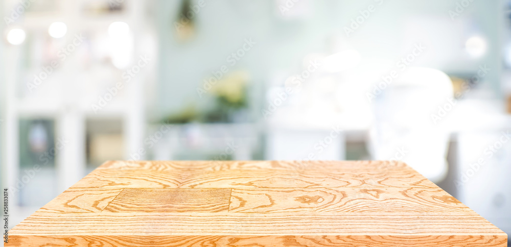 Poster perspective wood table counter in home office.empty wooden tabletop with blurred workplace backgroun